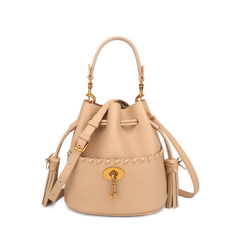 European and American First Layer Cowhide Women's New Genuine Leather Handbag Trendy Bucket Bag Tassel Niche Drawstring Shoulder Crossbody Bag