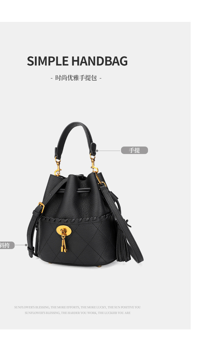 European and American First Layer Cowhide Women's New Genuine Leather Handbag Trendy Bucket Bag Tassel Niche Drawstring Shoulder Crossbody Bag