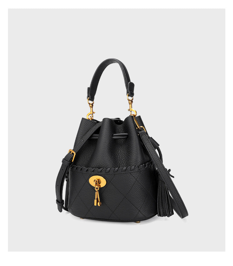 European and American First Layer Cowhide Women's New Genuine Leather Handbag Trendy Bucket Bag Tassel Niche Drawstring Shoulder Crossbody Bag