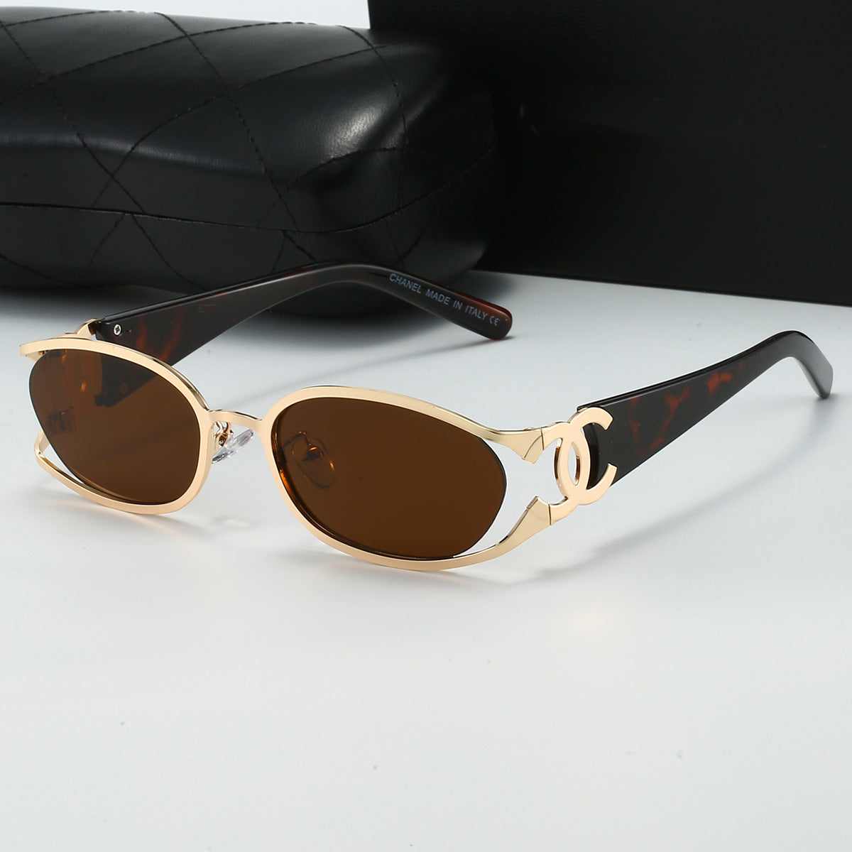 Chanel Style Double C Letter Sunglasses Metal Frame gold Hollow Temple Sunglasses for Women Oval Vintage Style Fashionable
