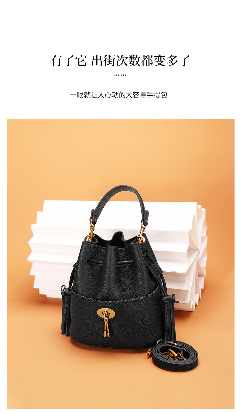 European and American First Layer Cowhide Women's New Genuine Leather Handbag Trendy Bucket Bag Tassel Niche Drawstring Shoulder Crossbody Bag