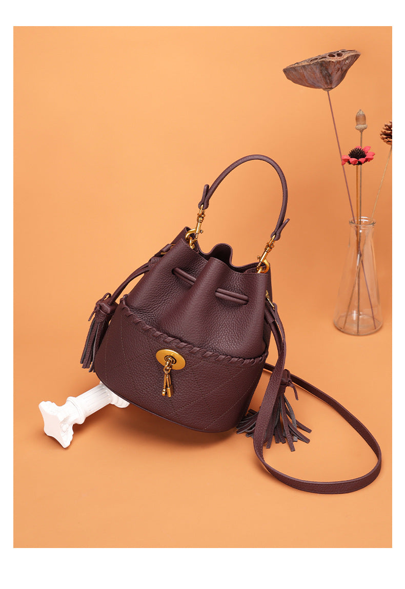 European and American First Layer Cowhide Women's New Genuine Leather Handbag Trendy Bucket Bag Tassel Niche Drawstring Shoulder Crossbody Bag